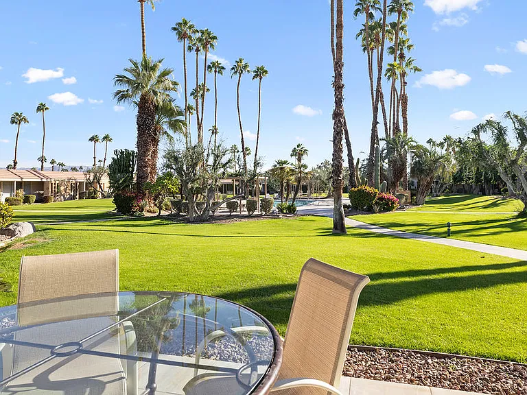 BACK PATIO LOOKS OUT ONTO AN EXPANSIVE PARK