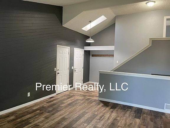 This home has a modern Farmhouse vibe, vaulted ceilings and skylights!