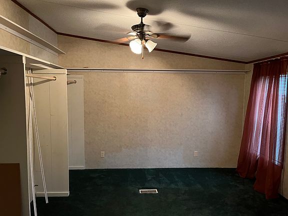 This room attached to the master bedroom can be used as walk-in closet, nursery, or office space!!