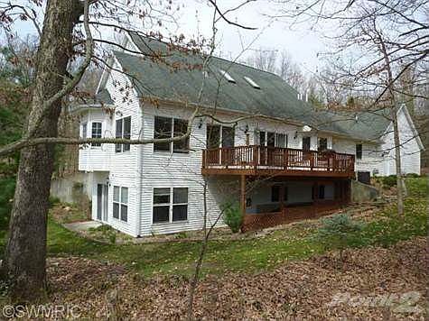 Note the walk-out and the deck and patio