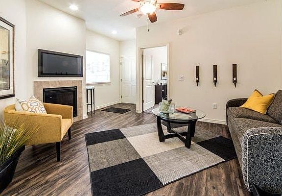 Living room, dining room, and kitchen have Shaw LPV flooring