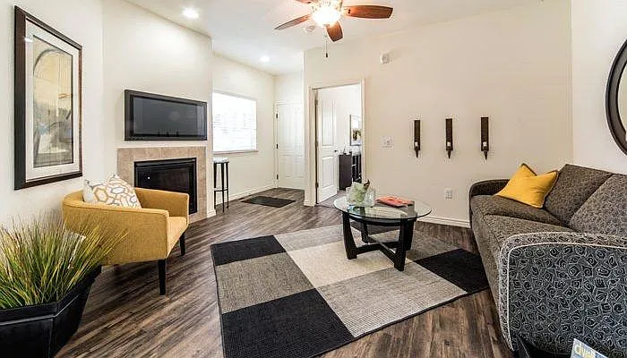 Living room, dining room, and kitchen have Shaw LPV flooring