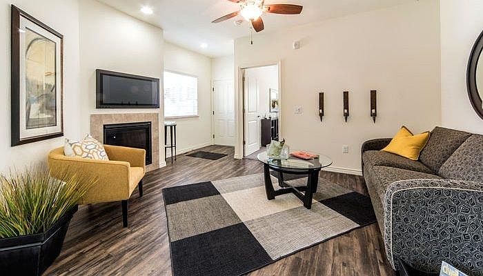 Living room, dining room, and kitchen have Shaw LPV flooring
