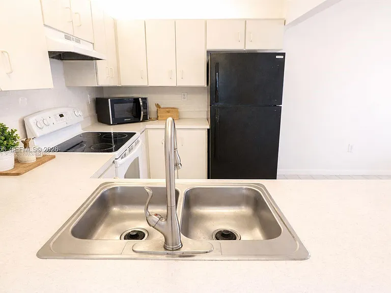 464 NE 210th Circle Ter #204 — Photo 24