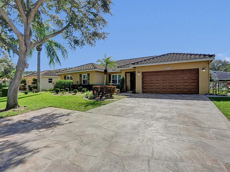 4142 NW 58th Dr — Photo 1