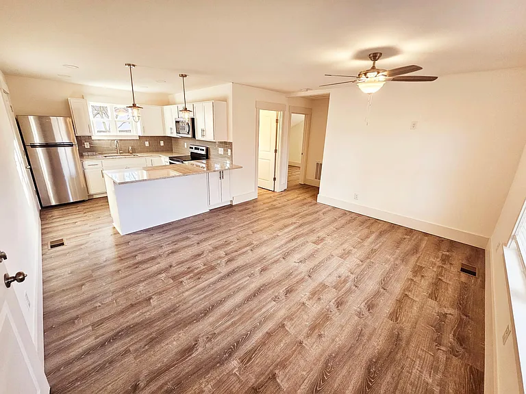 The living room adjoins the kitchen for great open living spaces.