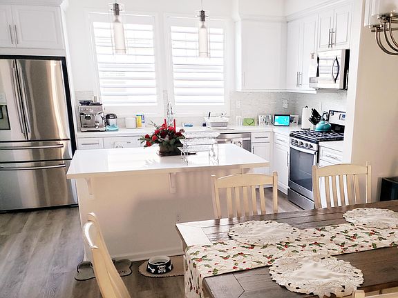Walk in pantry not in photo, island has more storage.