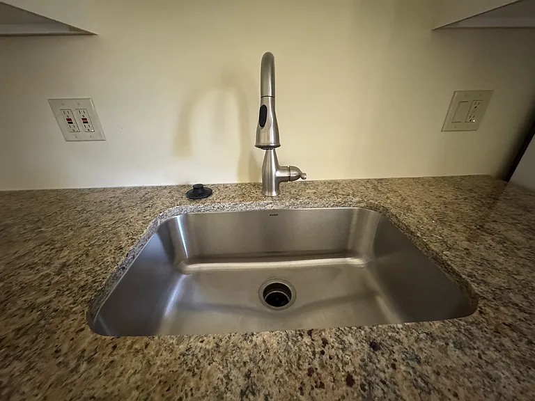 New sink and faucet in kitchen