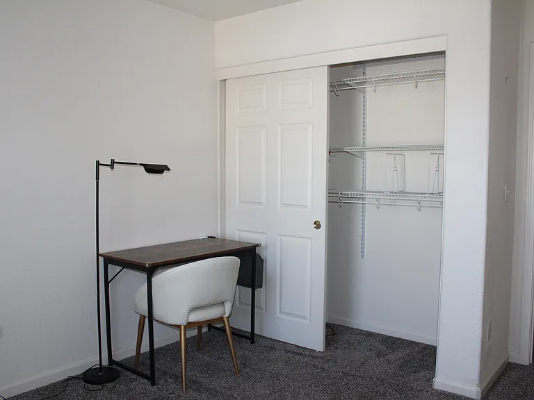 the third bedroom and closet