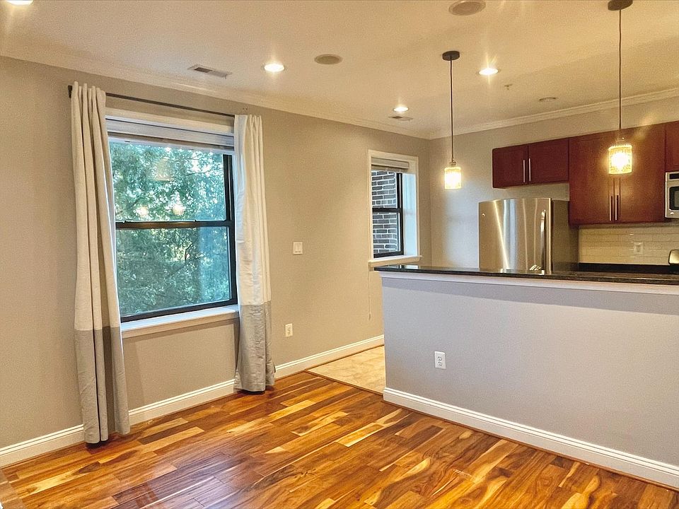 View of living/kitchen area from the entrance.