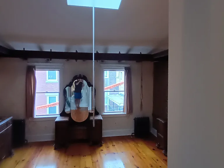 Third Floor bedroom with skylight.