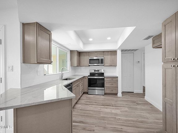 4th image of 7841 E HARVARD Street