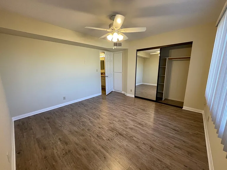Bedroom with Laminate Flooring