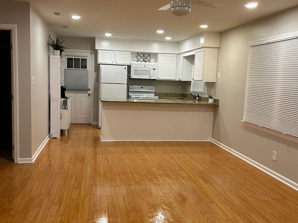 open design into kitchen. Top down/bottom up shades