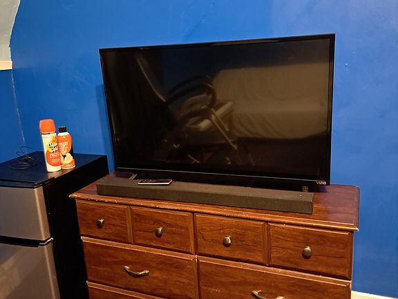 TV, dresser.
Fridge is extra.