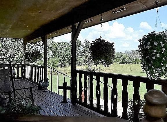 Check out the panoramic views from this oversized front porch and watch the deer graze.