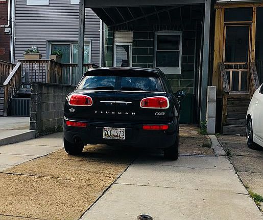 Parking pad at back of house and second story deck