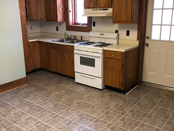 Kitchen with new natural gas range/oven