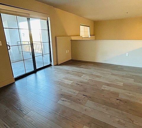 Upstairs loft with full size washer dryer and open deck