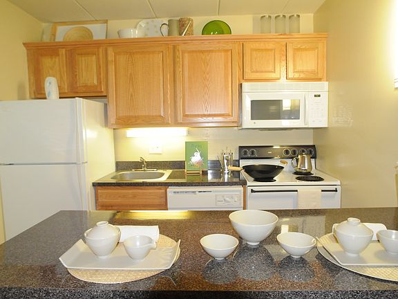 open layout kitchen w/ breakfast bar.