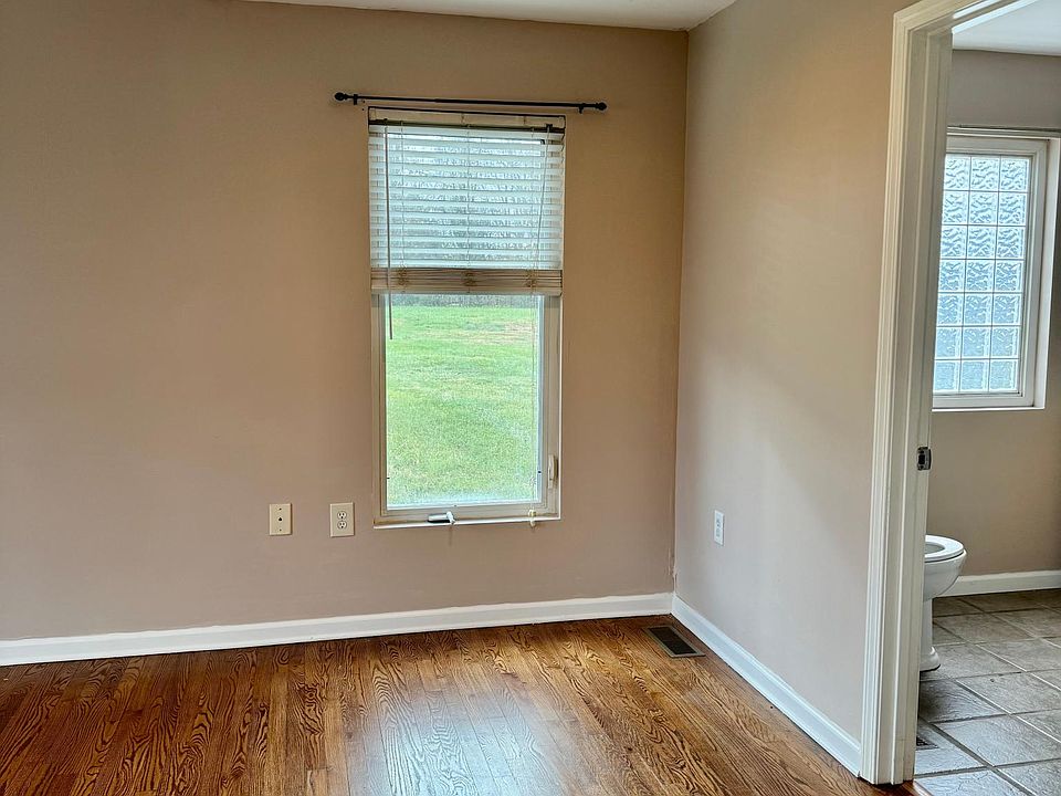Main floor bedroom with in-suite bath and closet.