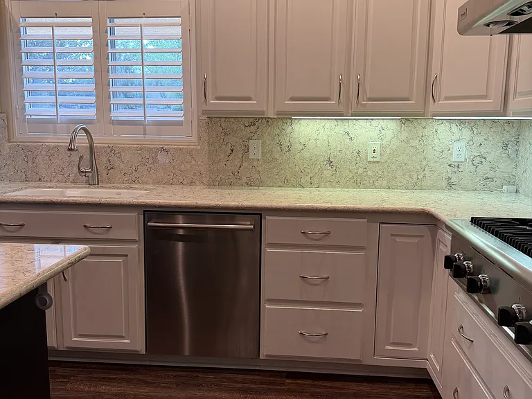Kitchen with lots of cabinets and under cabinet lighting