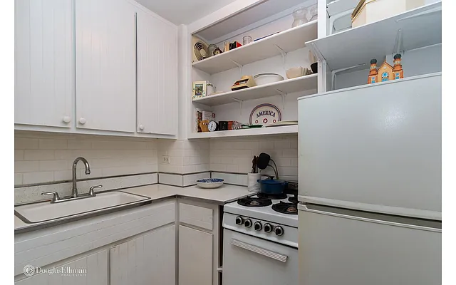 Sold by Douglas Elliman | media 13