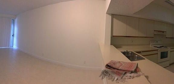living / dining / kitchen / entry