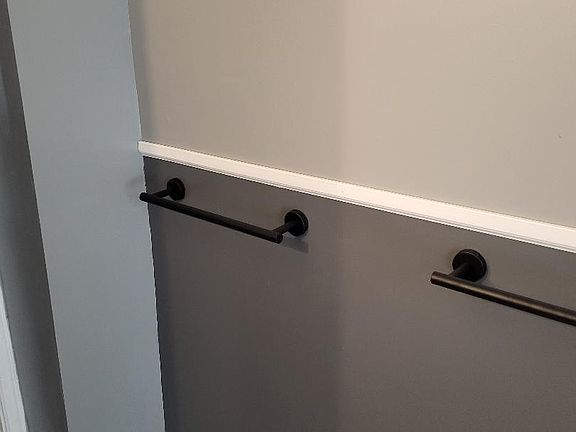 Beautiful two toned bath with beautiful accents