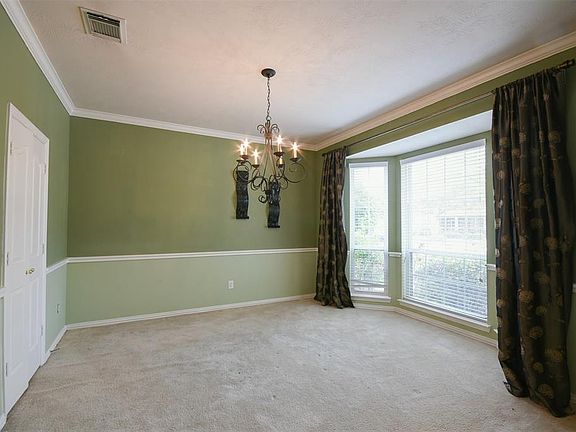 Formal dining room with beautiful chandelier
