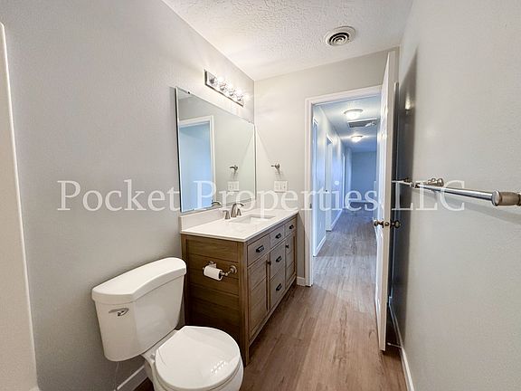 Upstairs hall bathroom with new vanity and LVP flooring