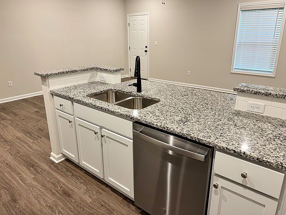 Granite bar with deep sink _ perfect for cooking or entertaining.
