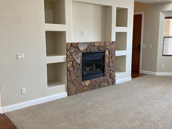 Fireplace and built in shelves
