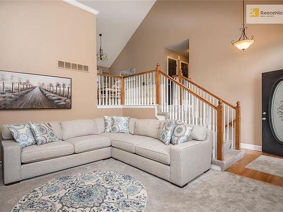 The floor plan is open to the Kitchen and Dining areas.