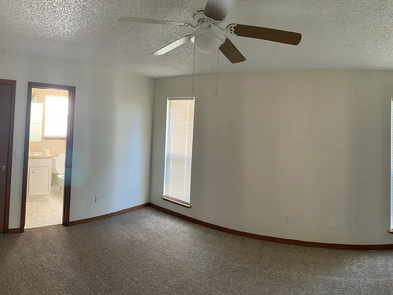 Panorama view of the master bedroom.