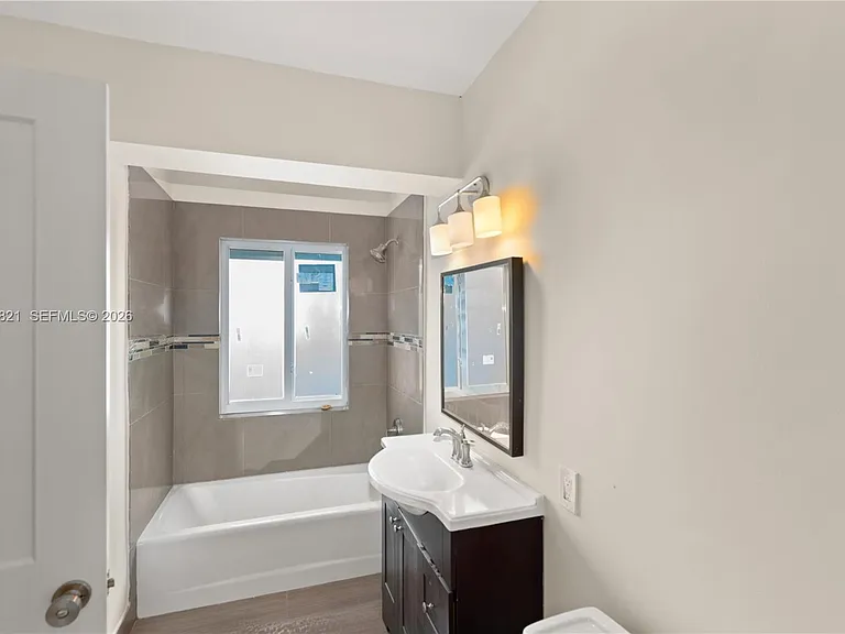5614 San Vicente St — Photo 25