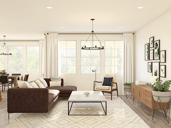 Great room with gorgeous flooring and chandelier