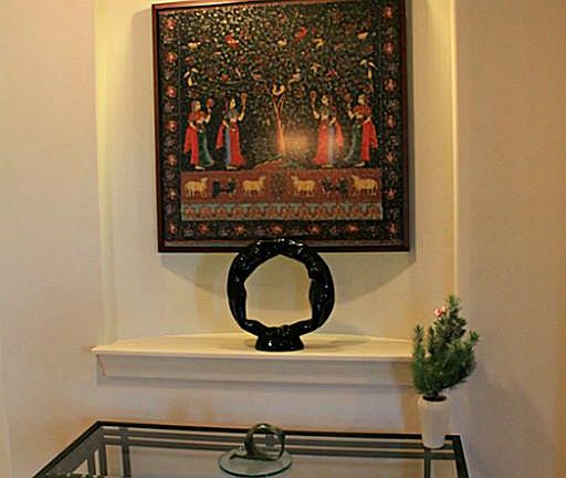 Entering the front door, you'll notice this beautiful custom foyer "nook" that is large enough to di