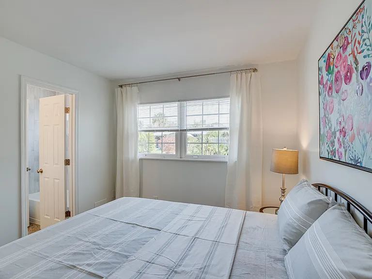 Furnished bedroom #2 with access to completely remodeled Jack & Jill bath
