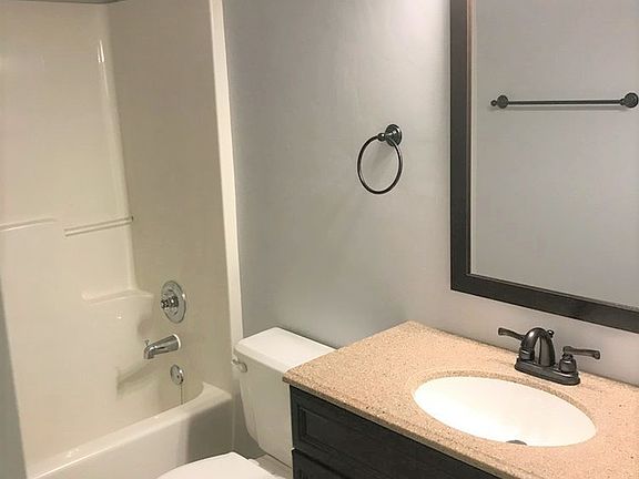 Updated full bathroom, includes new vanity, fixtures and flo