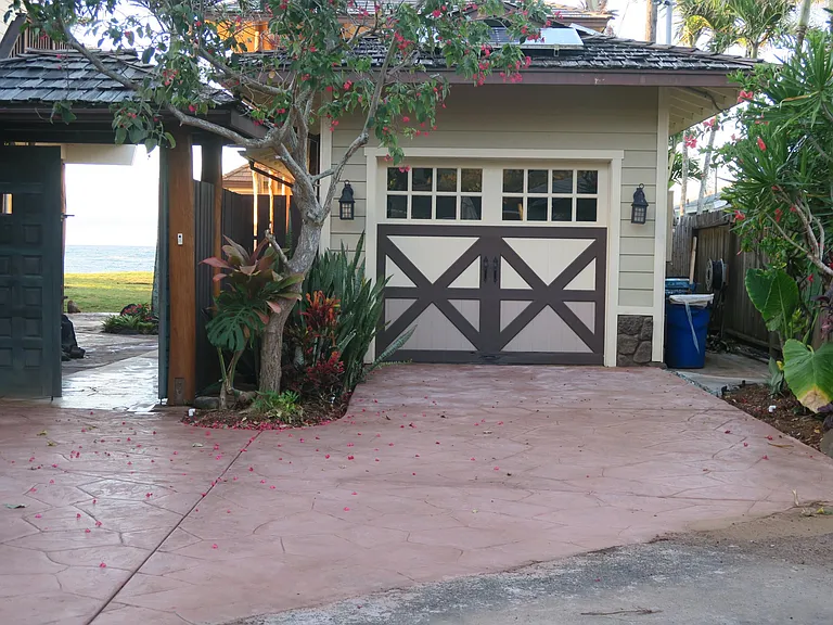 Parking is in front of this garage on private property.