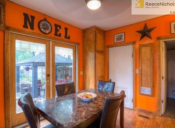 French doors to the backyard oasis lets in a ton of natural ligh