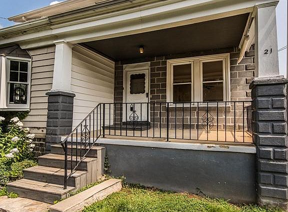 Inviting front porch extends living space outside