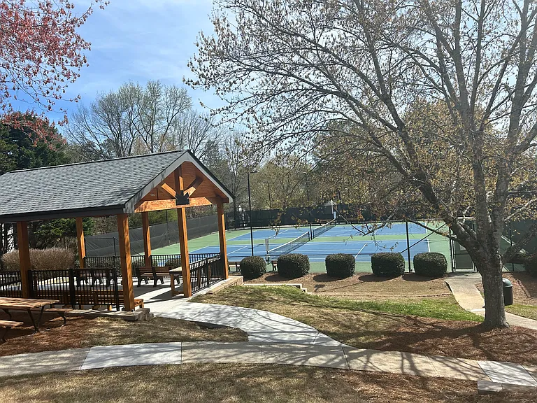 Three separate Tennis court and one basketball court minutes walk from house.
