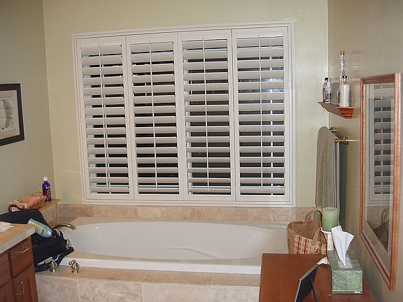 Master bathroom tub with window overlooking AMAZING mountain view