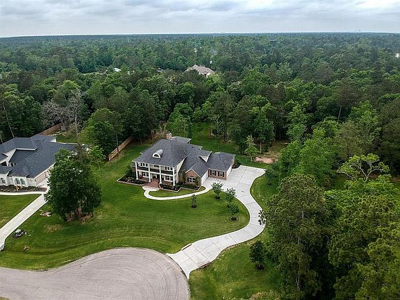 "Stop the Car" Curb Appeal on this Benders Landing Estates cul-de-sac stunner. In this market a 1.75 acre lot with a beautiful custom home is a rare find.