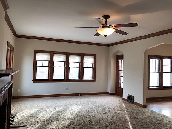 Large Living Room with fireplace and side entrance
