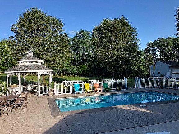 Poolside lounging and gazebo