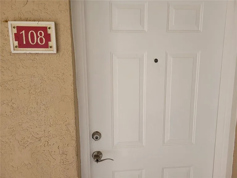 5005 Wiles Rd #108 — Photo 9