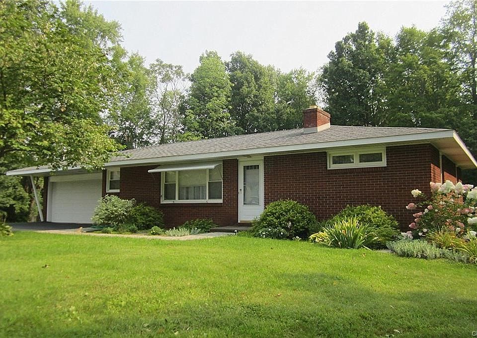 Sharp Brick Ranch majestically situated at the top of the Evans Drive cul-de-sac boasts a newer roof, windows, exterior doors & garage overhead door.
